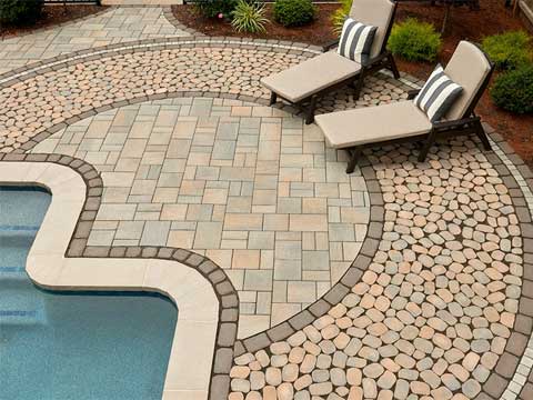 techo bloc pavers surround a pool deck