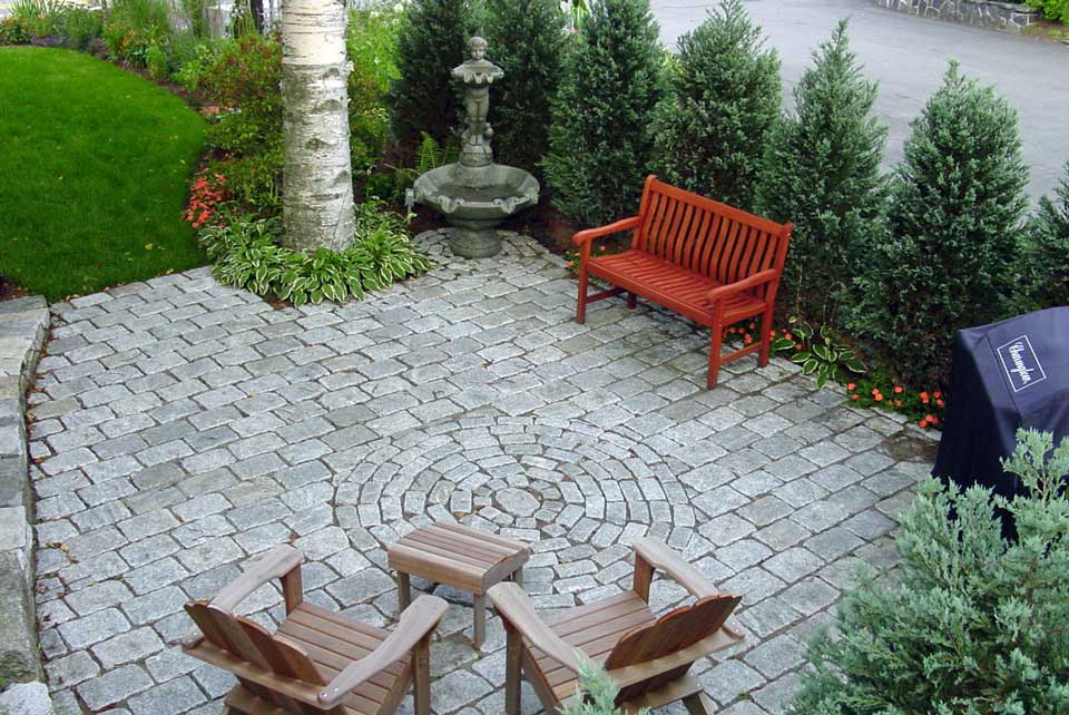 front entry with pavers and natural stone steps