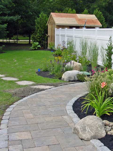 close up view of a gas fire pit insert overlooking the marsh in wells maine