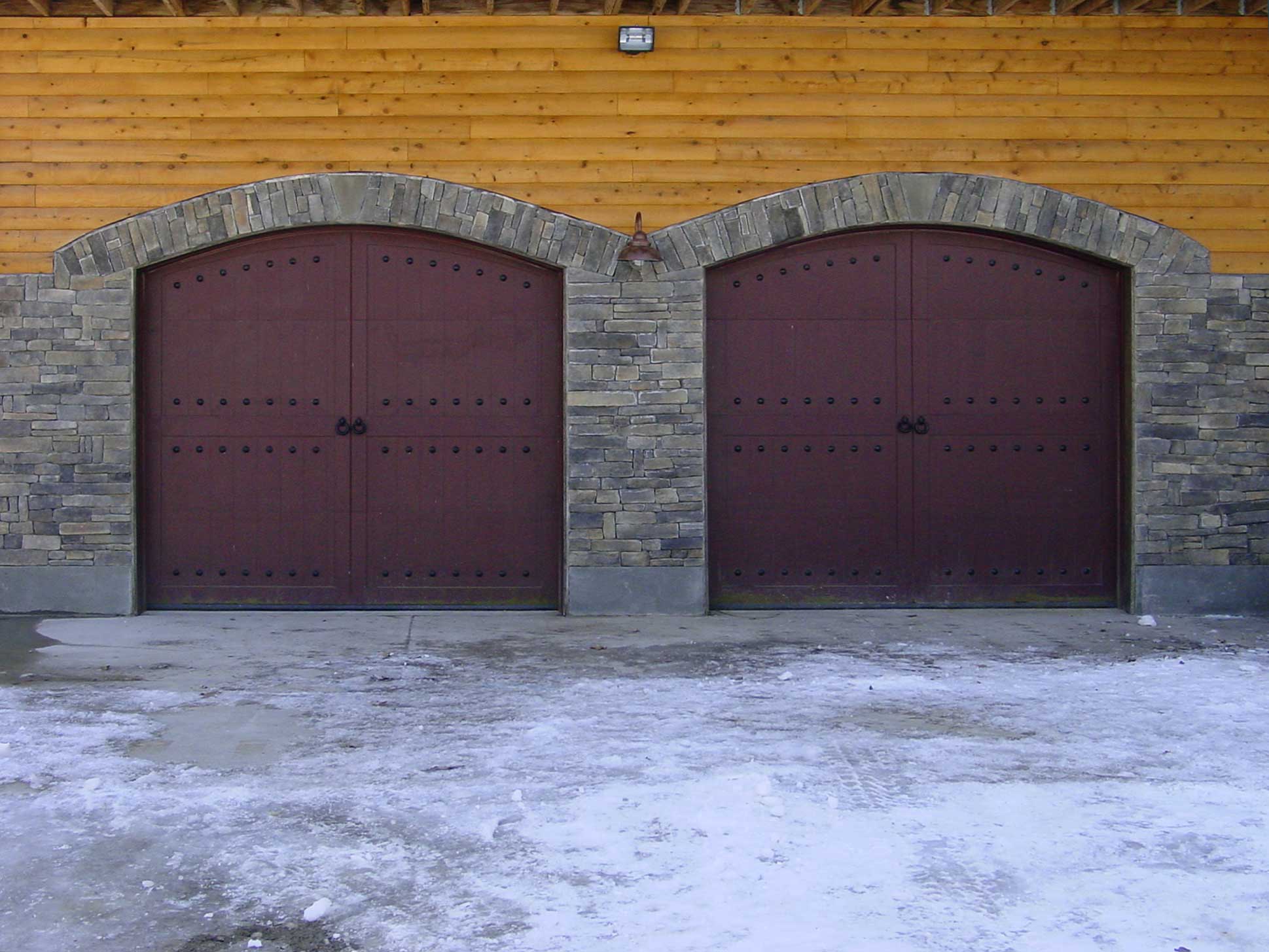 stone veneer enhances a beautiful log home