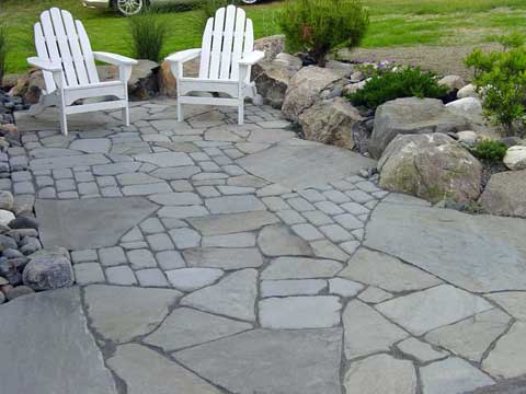 techo bloc pavers surround a pool deck